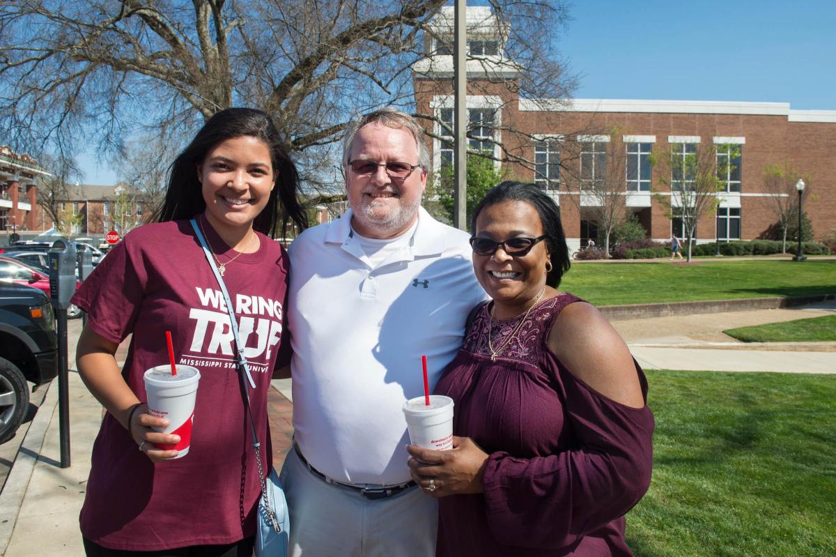 Family poses at Spring Preview Day